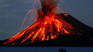 Krakatau volcano: Fishermen sail in front of Anak Krakatau as it erupts in June 2009