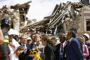 G8 summit: Silvio Berlusconi and Chancellor Angela Merkel visit the village of Onna