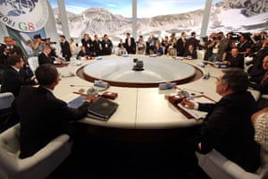 G8 summit update: World leaders from the G8 group of nations attend a round-table discussion