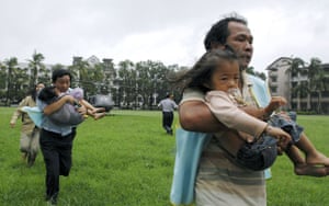 Typhoon Marakot: Kaohsiung county, Taiwan: Medical personnel evacuate children