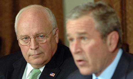 President George W Bush speaks to the media as Vice President Dick Cheney listens