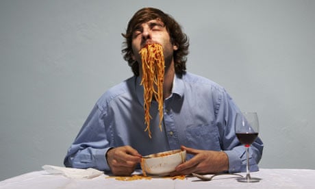 Man eating spaghetti