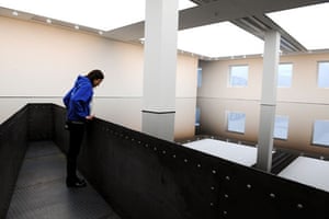 Richard Wilson 20:50: A visitor peers into the oily reservoir