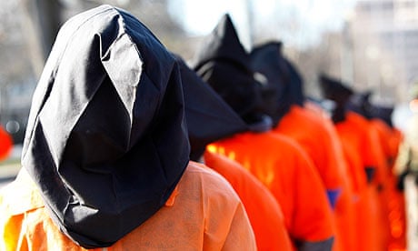 Human rights campaigners protest against Guantanamo Bay in front of the White House