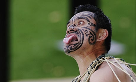 A Maori man performing a Haka