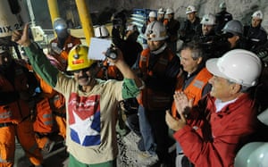 Chile miners rescue: Chilean miner Juan Illanes celebrates after being brought to the surface 