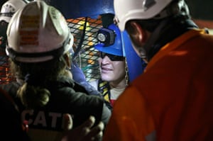 Chile miners rescue: Osman Araya, 29, becomes the sixth miner to exit the rescue capsule