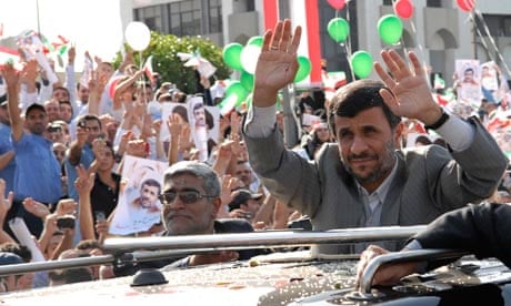 Mahmoud Ahmadinejad waves to the crowds on his arrival in Beirut