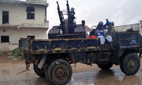 Islamic gunmen patrol in Mogadishu, Somalia