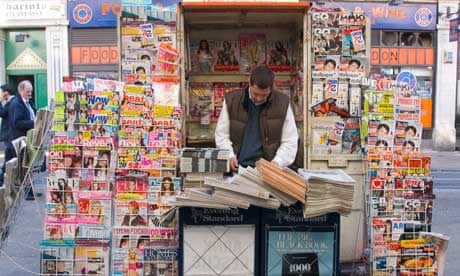Newspaper seller in a London street