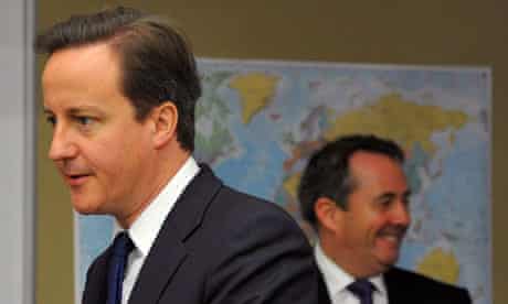 David Cameron and Liam Fox at the Permanent Joint Headquarters in London on 19 October 2010.