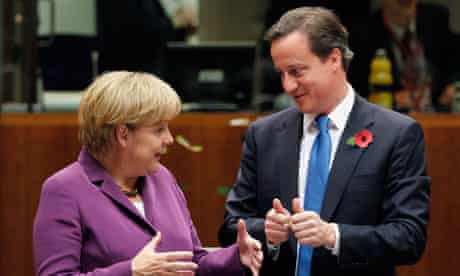 Angela Merkel and David Cameron at the EU summit in Brussels on 29 October 2010.