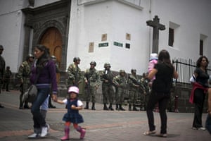 24 hours in pictures: Ecuadorean soldiers stand guard after the recent coup attempt by police