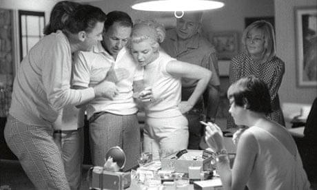 Frank Sinatra and Marilyn Monroe with Peter Lawford. 
