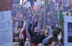 Students protest: Demonstrators gesture outside the Conservative Party headquarters building
