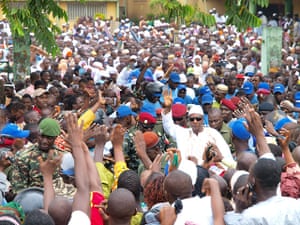 Guinea: Guinea president elect Alpha Conde is surrounded by supporters in Conakry
