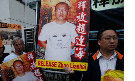 Pro-democracy campaigners hold picture of Zhao Lianhai