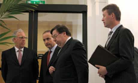 Irish Prime Minister Brian Cowen leaves a news conference