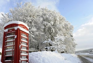 Snow: Snow covers a telephone box in Crathie in Scotland