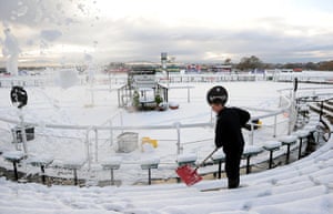 Winter Weather Update: Snow is moved from the steps at Newcastle Racecourse