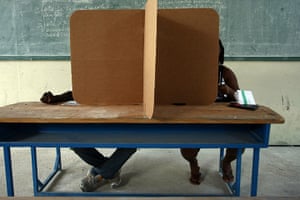 Haiti Elections: Two Haitians prepare their votes at the