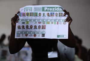 Haiti Elections: A Haitian electoral worker shows a presidential ballot