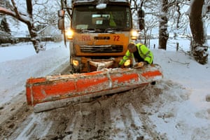 More Snow hits the UK: A snow plough clears snow in Denny, Central Scotland