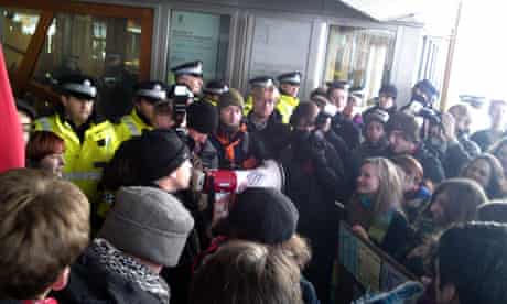 Police protect the entrance to Holyrood