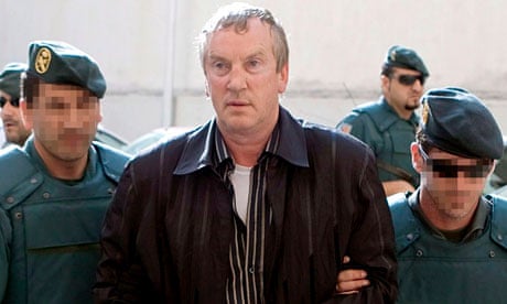 WikiLeaks cables: Gennady Petrov is escorted by police after his arrest in Calvia, Spain, in 2008