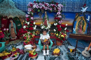 Guadalupe festival : A girl sits while having her photo taken