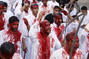 Ashura Religious Festival: Shi'ite Bahraini men are seen covered with blood during Ashura 