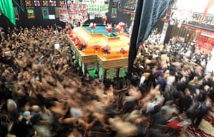 Ashura Religious Festival: Shiite Muslims flagellate themselves during Ashura rituals in Tehran