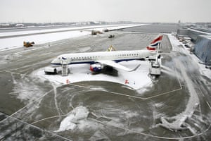 Winter weather: A British Airways plane is parked at  London City Airport