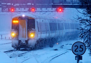Winter weather: A delayed Southeastern Train arrives at Ashford International Station