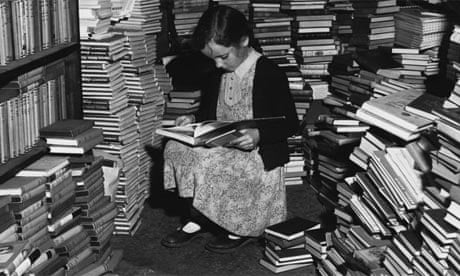 Little girl reads in bookshop
