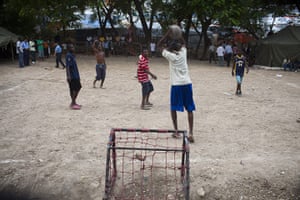 Haiti Cité Maxo: Haitian play football at the camp Cité Maxo in Petionville, Port-Au-Princem