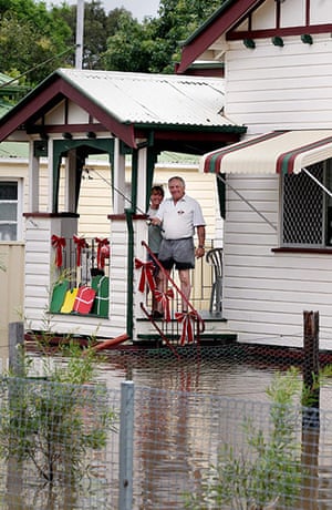 Queensland Flooding: Chinchilla resident Jim Casey and wife Lesley stand on their balcony