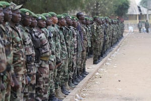 Ivory Coast: Rebels stand at attention during a military ceremony in Bouake
