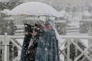 snow in Rome: Two nuns film with their camera