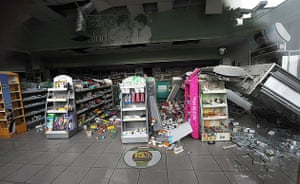 Chile Earthquake: The walls and aisles of a pharmacy in Vina del Mar are seen destroyed