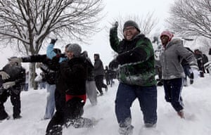 Washington in the snow: People take part in a impromptu snowball fight at Meridian Hill Park