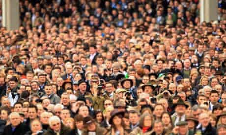 Crowds await the first race during Gold Cup day at the Cheltenham Festival
