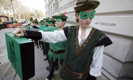 Robin Hood tax campaigners protest outside the Treasury