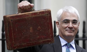 Alistair Darling holds the budget box outside 11 Downing Street on 24 March 2010.