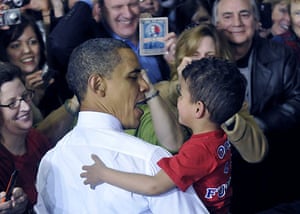 24 hours in pictures: Iowa City, US: Barack Obama meets 4 year old Barack Anthony Stround