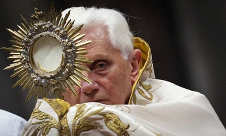 Pope Benedict holds host