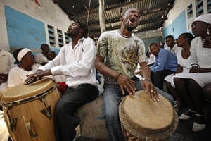 24 hours: Haitians take part in voodoo ceremony in port-au-prince slum