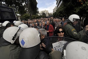Greece protests: Greek pensioners through a riot police cordon, Athens, Greece