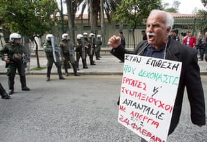 Greece protests: A pensioner shouts slogans in protest, Athens Greece
