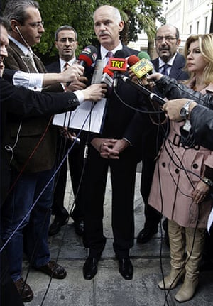 Greece protests: Greek Prime Minister George Papandreou speaks to reporters, Athens